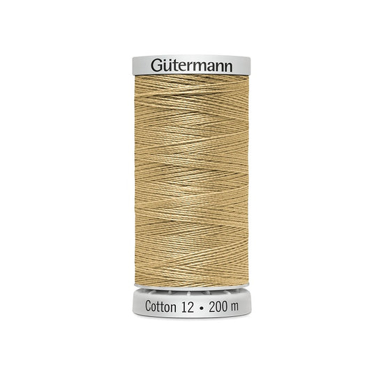 Spool of rich beige thread with Gutermann Cotton 12 branding.