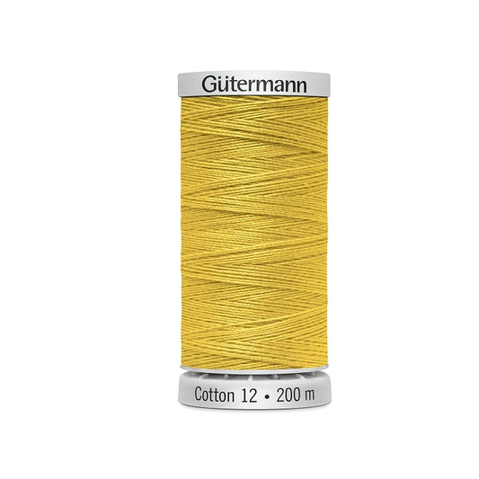 Spool of ochre yellow thread with Gutermann Cotton 12 branding.
