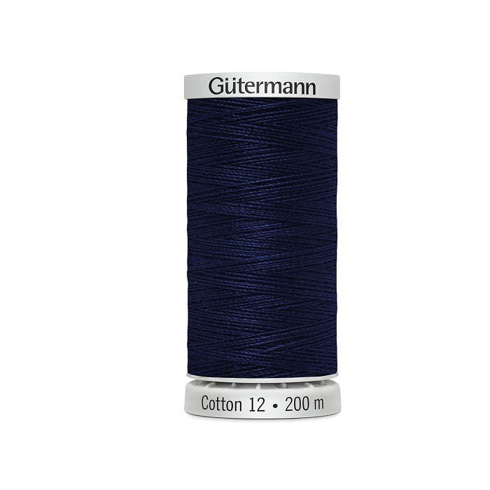 Spool of dark violet blue thread with Gutermann Cotton 12 branding.