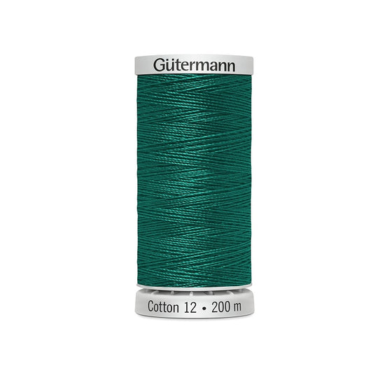 Spool of dark sea green thread with Gutermann Cotton 12 branding.