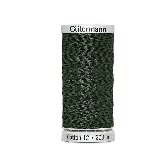 Spool of dark green thread with Gutermann Cotton 12 branding.