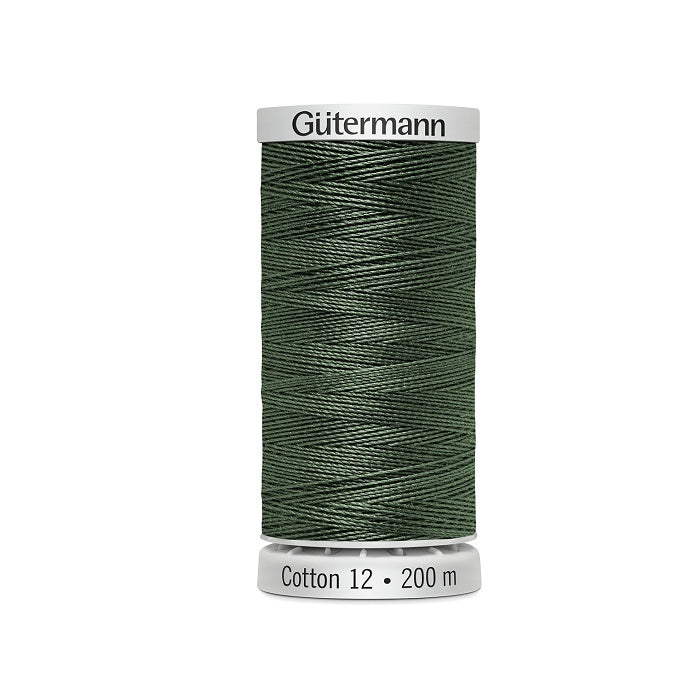 Spool of greyish green thread with Gutermann Cotton 12 branding.
