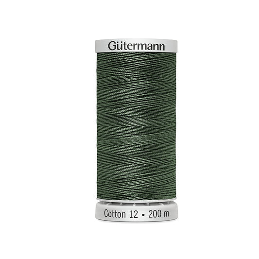 Spool of greyish green thread with Gutermann Cotton 12 branding.