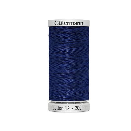 Spool of dark blue thread with Gutermann Cotton 12 branding.