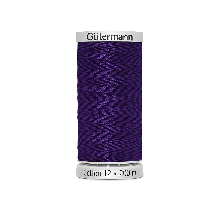 Spool of dark purple thread with Gutermann Cotton 12 branding.
