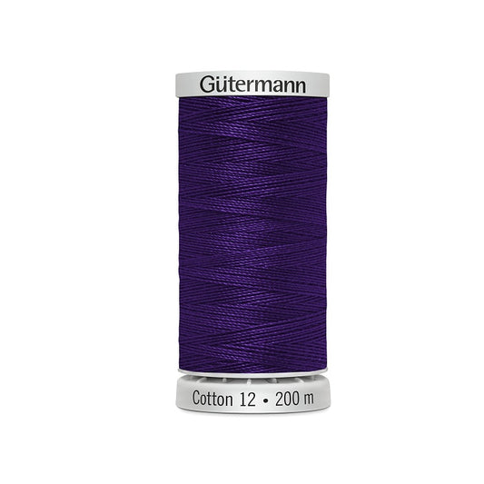 Spool of dark purple thread with Gutermann Cotton 12 branding.