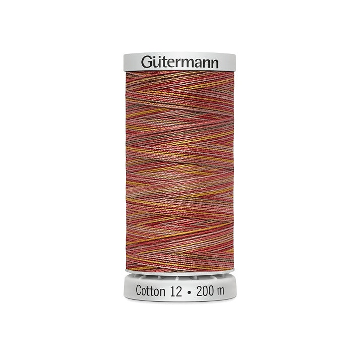 Spool of orange variegated thread with Gutermann Cotton 12 branding.
