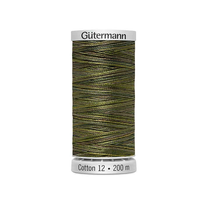 Spool of green variegated thread with Gutermann Cotton 12 branding.