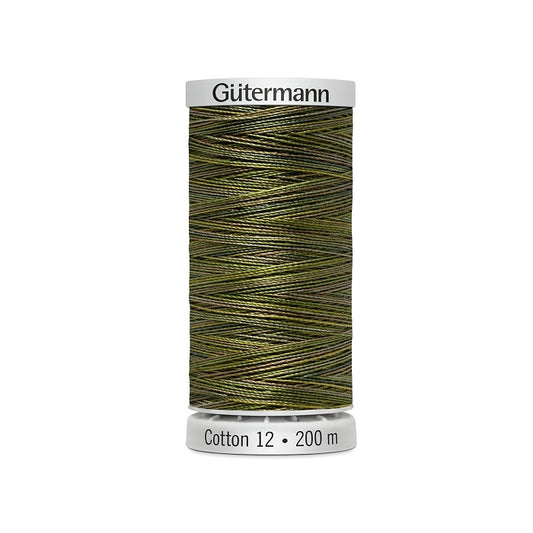 Spool of green variegated thread with Gutermann Cotton 12 branding.