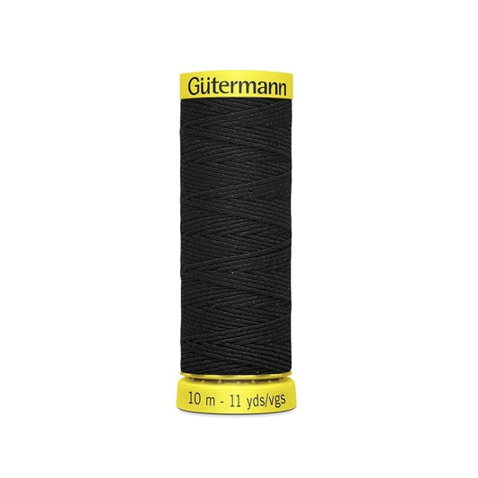 Black elastic sewing thread spool with gutermann branding.