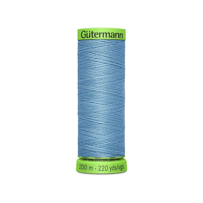Spool of blue extra fine thread with Gutermann branding.
