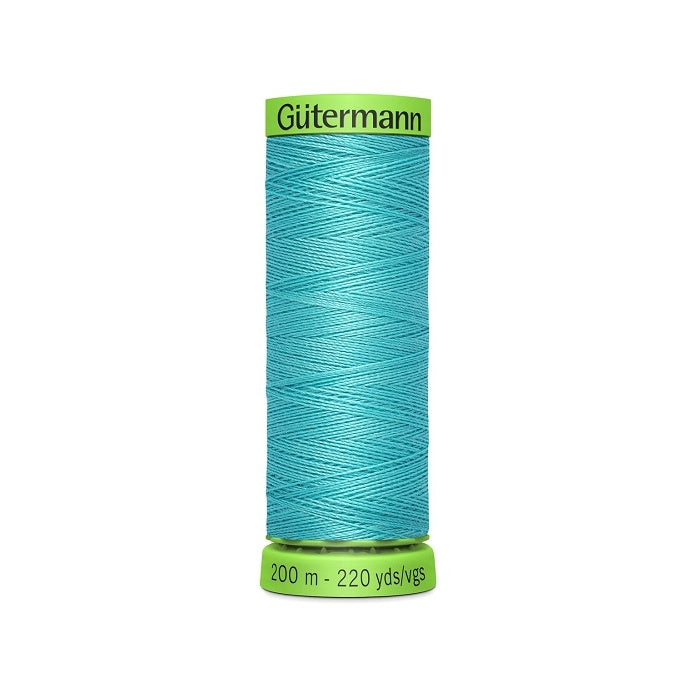 Spool of blue extra fine thread with Gutermann branding.