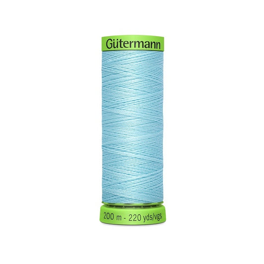 Spool of light blue extra fine thread with Gutermann branding.