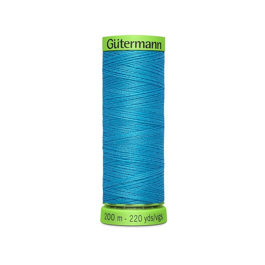 Spool of blue extra fine thread with Gutermann branding.