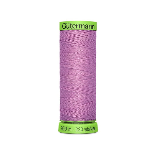 Spool of purple extra fine thread with Gutermann branding.