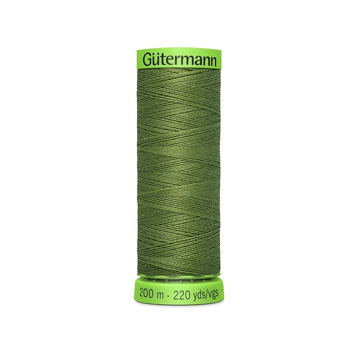 Spool of dark green extra fine thread with Gutermann branding.
