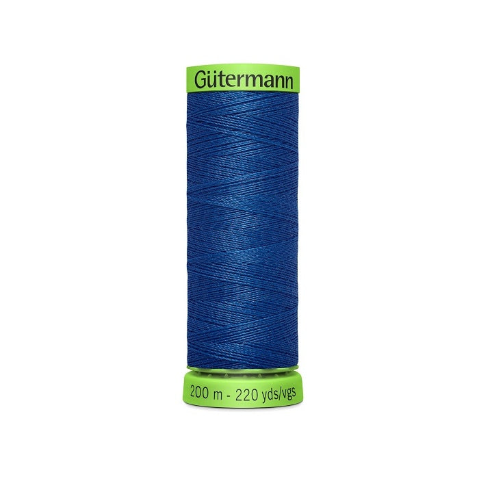 Spool of blue extra fine thread with Gutermann branding.