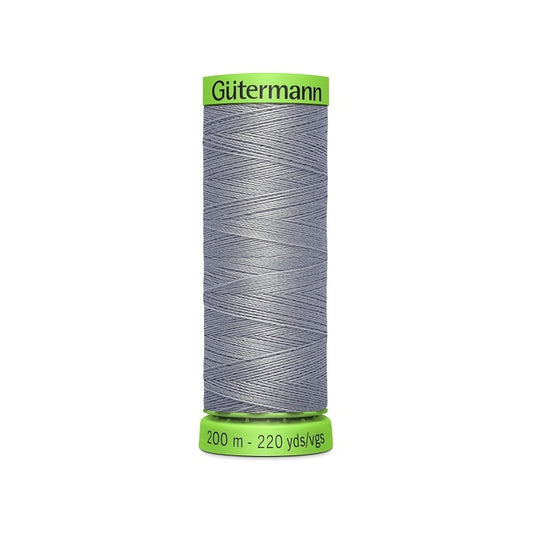 Spool of grey extra fine thread with Gutermann branding.
