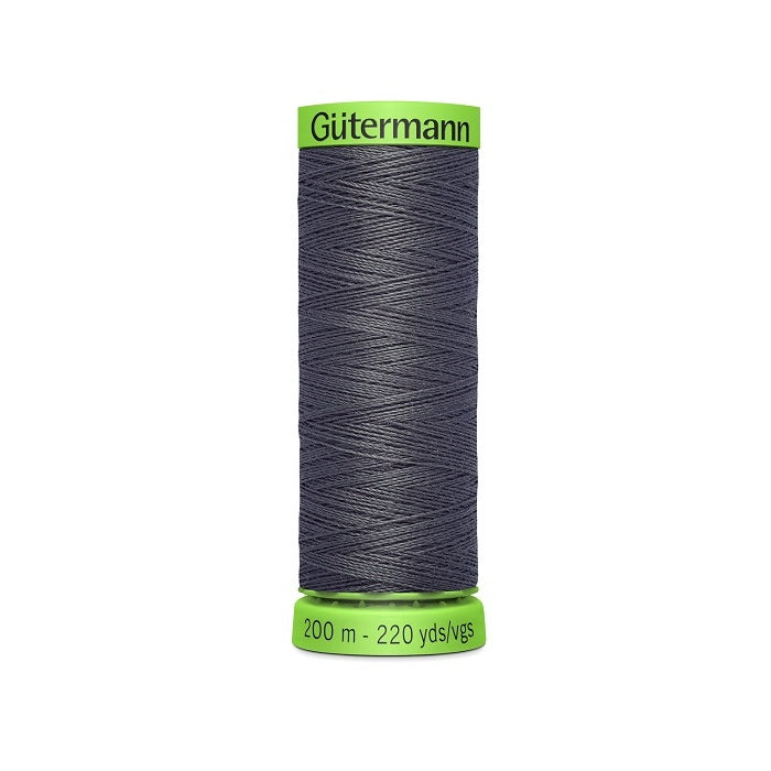 Spool of dark grey extra fine thread with Gutermann branding.