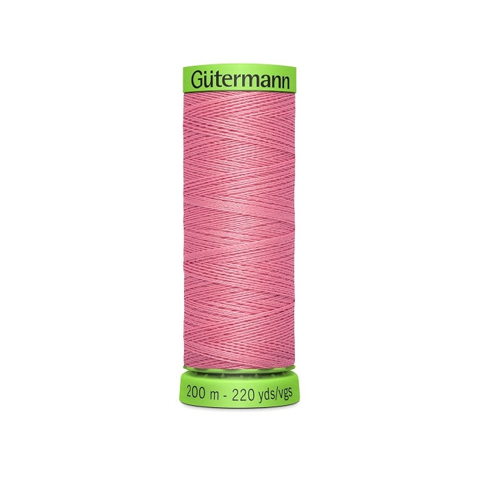 Spool of dark pink extra fine thread with Gutermann branding.