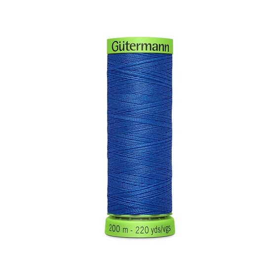 Spool of blue extra fine thread with Gutermann branding.