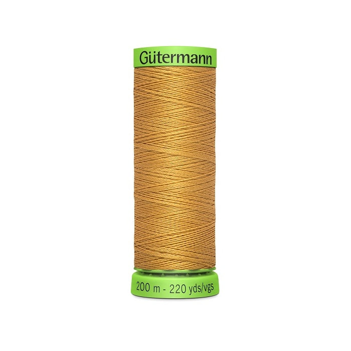 Spool of light brown extra fine thread with Gutermann branding.
