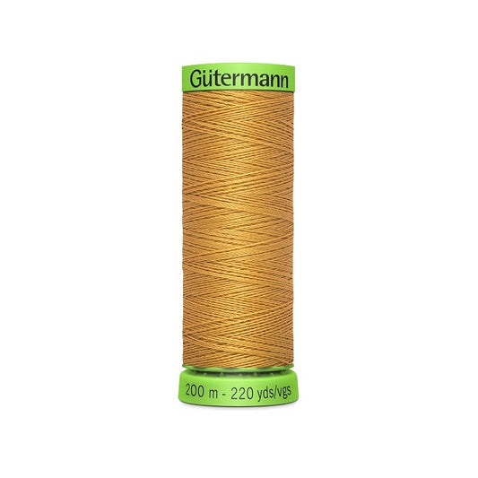 Spool of light brown extra fine thread with Gutermann branding.