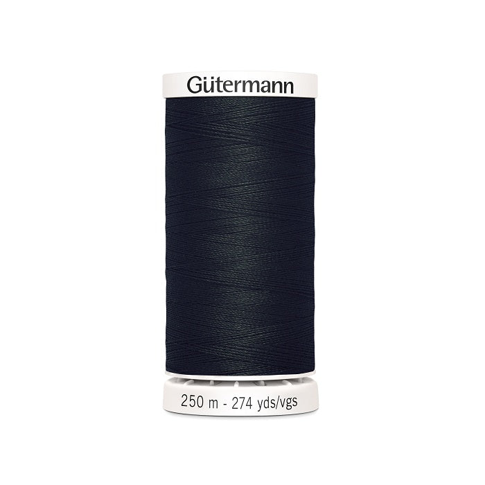 Black sewing thread spool with Gutermann branding.