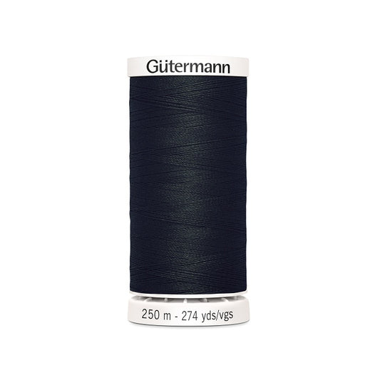 Black sewing thread spool with Gutermann branding.