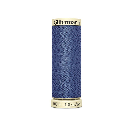 Spool of blue thread with Gutermann branding.
