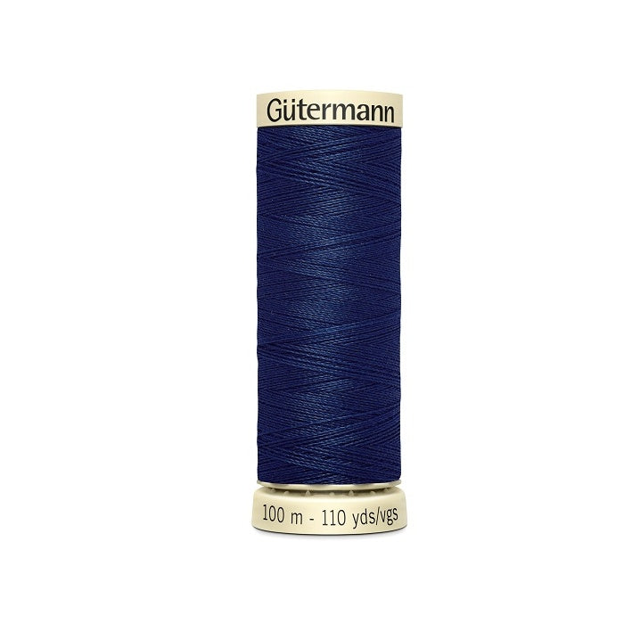 Spool of dark blue thread with Gutermann branding.