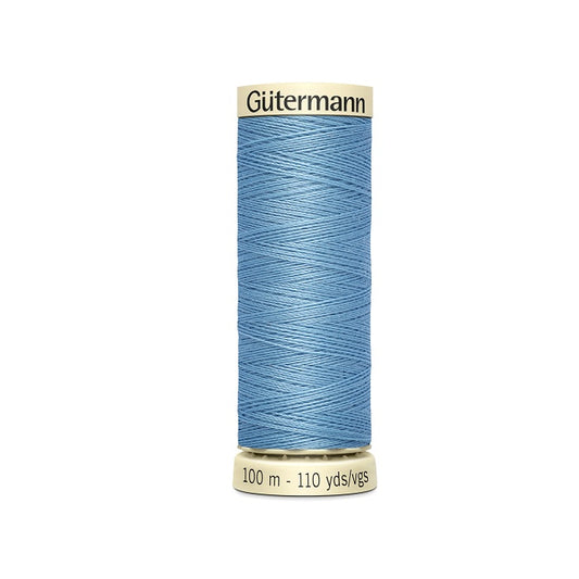 Spool of blue thread with Gutermann branding.
