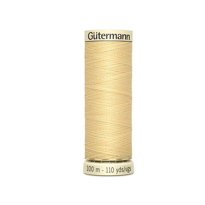 Spool of canary yellow thread with Gutermann branding.