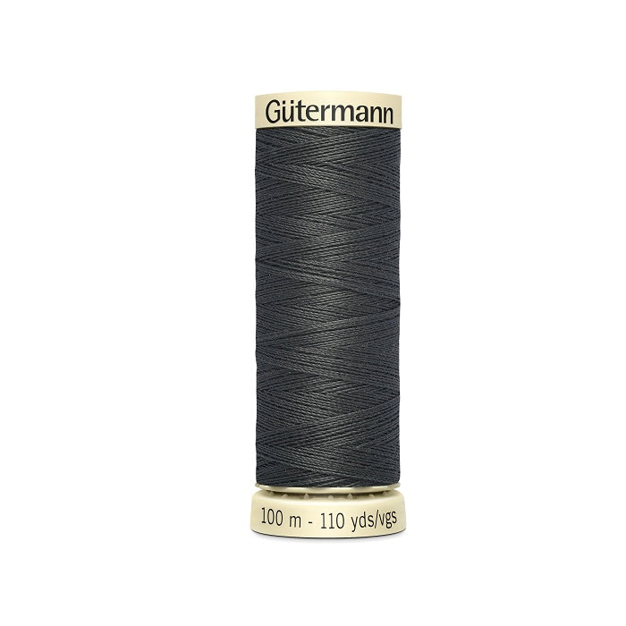 Spool of dark grey thread with Gutermann branding.