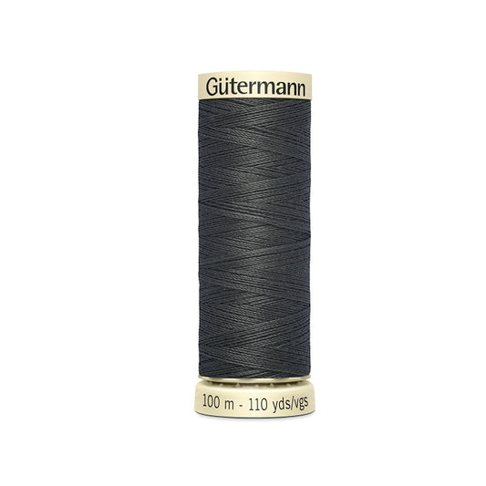 Spool of dark grey thread with Gutermann branding.