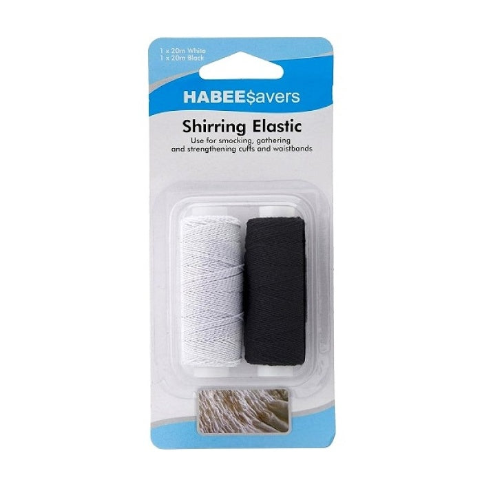 Packaged white and black shirring elastic spools.