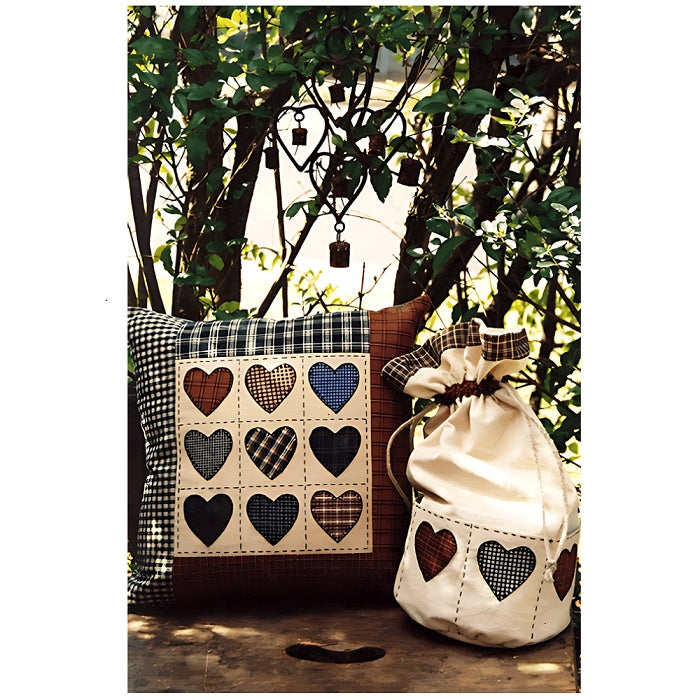 Cushion and bag with hearts applique.