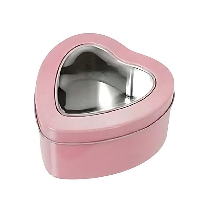 Pink heart shaped metal tin with a clear window in the lid.