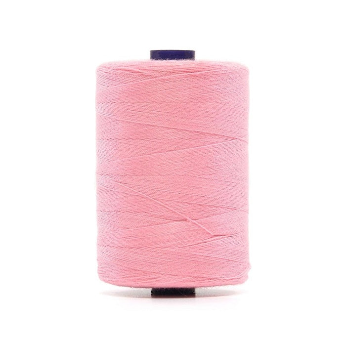 Spool of candy pink polyester sewing thread.