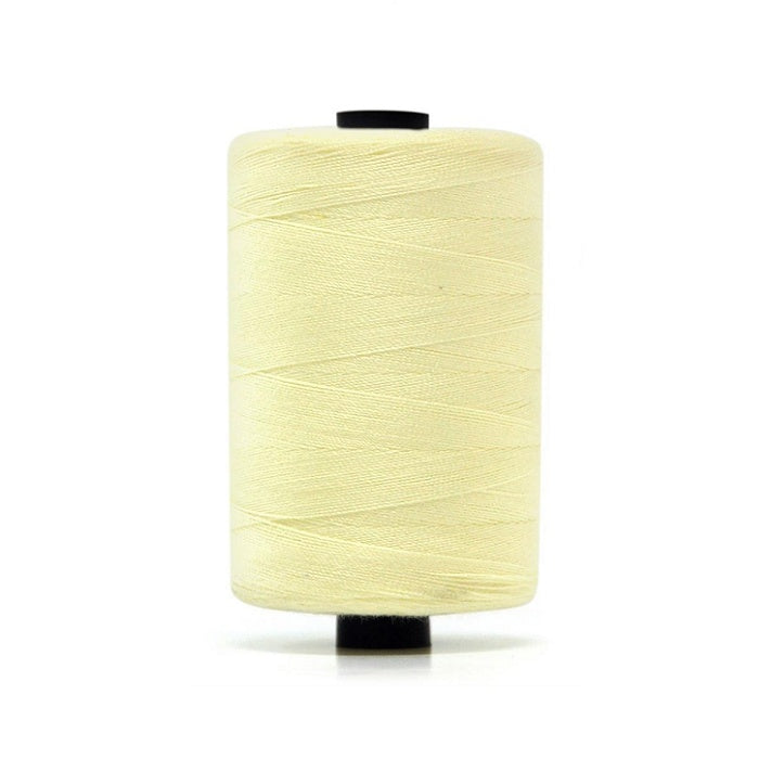 Spool of cream polyester sewing thread.