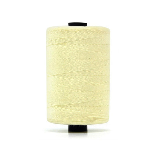 Spool of cream polyester sewing thread.