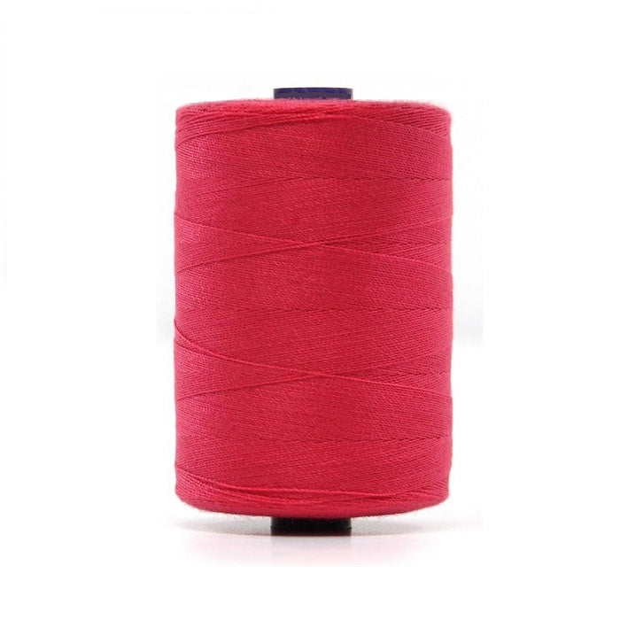 Spool of hot pink polyester sewing thread.