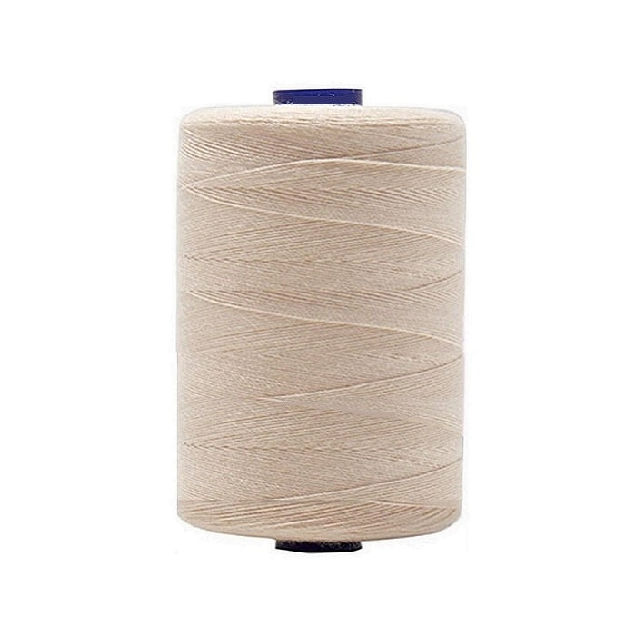Spool of ivory polyester sewing thread.