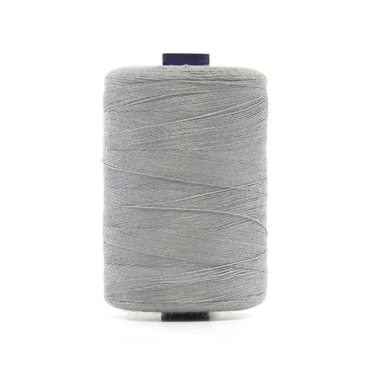 Spool of lite grey polyester sewing thread.
