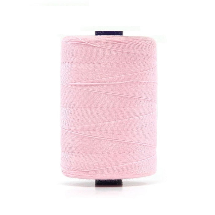 Spool of pink polyester sewing thread.