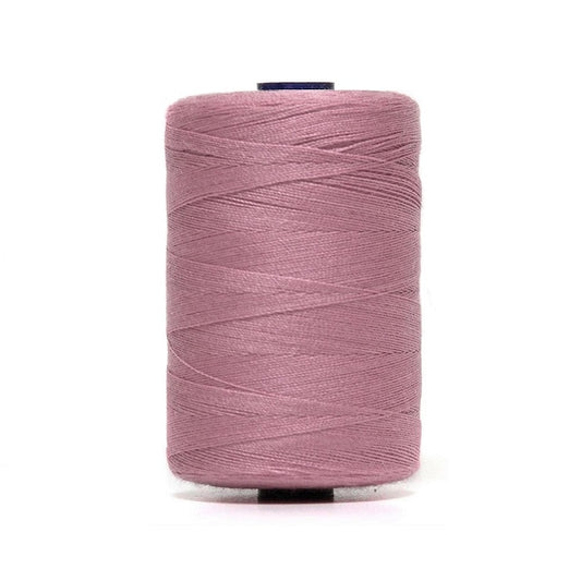 Spool of rose pink polyester sewing thread.