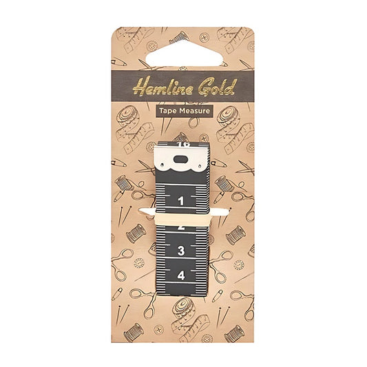Packaged black tape meaure with white markings.
