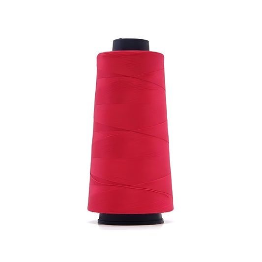 Hot pink overlocking thread cone.