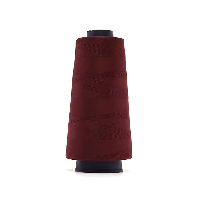 Burgundy overlocking thread cone.