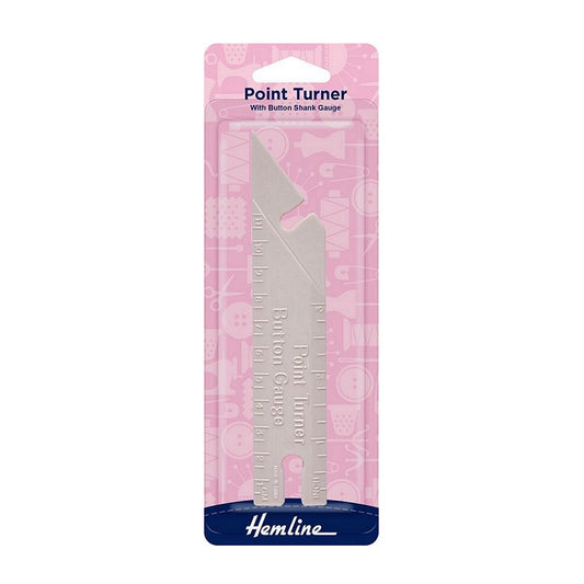 Packaged plastic point turner with Hemline branding.